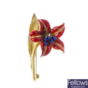 An enamel floral brooch.