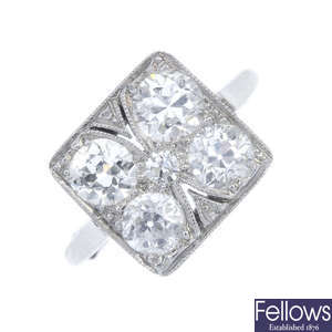 A mid 20th century 18ct gold and platinum diamond cluster ring.
