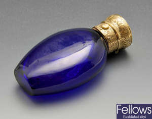 A Victorian blue glass scent bottle.