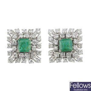 A pair of emerald and diamond ear studs.