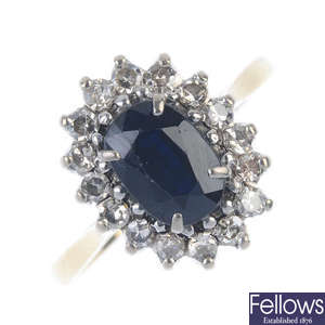A mid 20th century 18ct gold sapphire and diamond cluster ring.