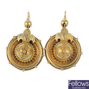 A pair of late 19th century gold ear pendants.