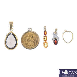 A selection of five pendants.