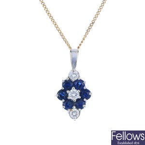 An 18ct gold diamond and sapphire pendant and chain. 