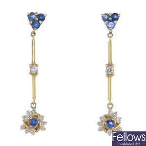 A pair of sapphire and diamond ear pendants.