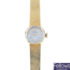 CANDINO - a lady's 18ct gold wristwatch 