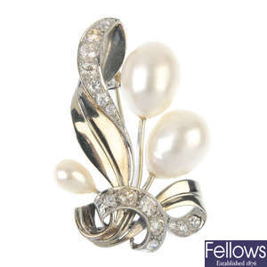 A mid 20th century cultured pearl and diamond floral spray brooch.
