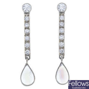 A pair of 18ct gold diamond and moonstone ear pendants. 