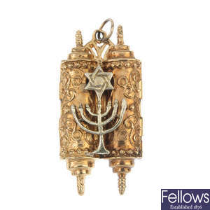 A 9ct gold Torah pendant.