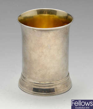 A George III silver beaker.