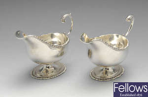 A pair of early 20th century silver sauce boats.