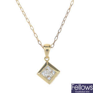 A diamond pendant and two chains. 