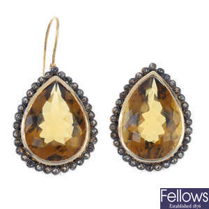 A pair of citrine and diamond ear pendants. 