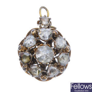 A diamond cluster pendant.