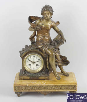 A French spelter and marble mantle clock