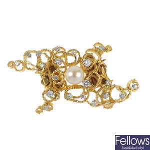 A 1970s cultured pearl and diamond clasp.