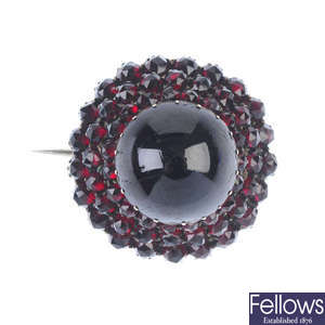 A late 19th century garnet and paste brooch.