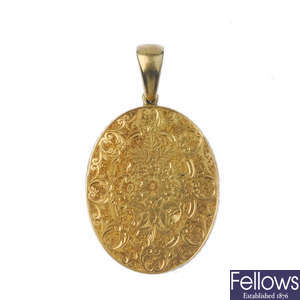 A late 19th century gold photograph pendant.