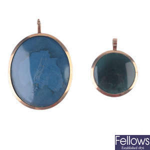 Two late 19th century 9ct gold photograph pendants.