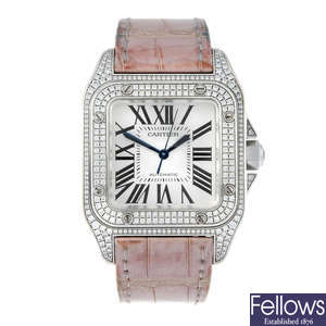 (199063) CARTIER - an 18ct white gold Santos 100 wrist watch.