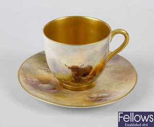 A Royal Worcester hand painted cup and saucer