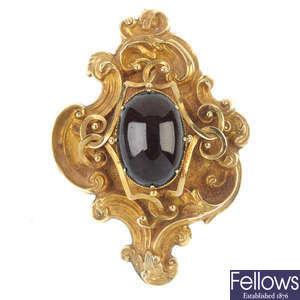 A late 19th century gold and garnet pendant.