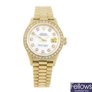 (127968-1-A) ROLEX - a lady's 18ct yellow gold Oyster Perpetual Datejust bracelet watch.
