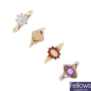 A selection of eight gem-set rings.