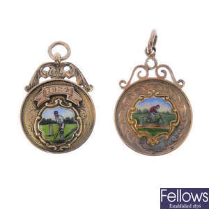 Two 1920s 9ct gold enamel medallions.