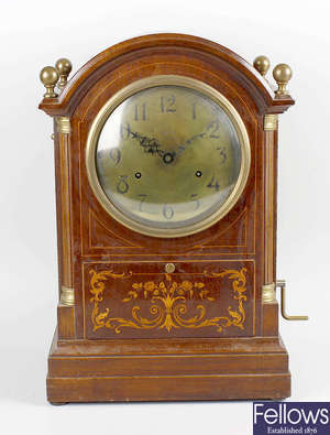 An unusual early 20th century "Sonora" inlaid mahogany cased bracket style clock
