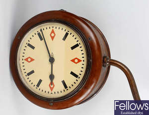  An unusual George the fifth general post office twin faced wall mounted shop or factory clock