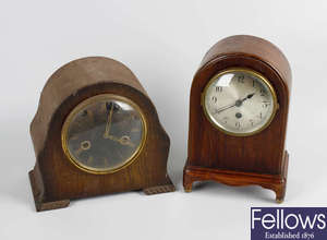 Six boxes containing a good mixed selection of assorted wooden cased clocks and clock cases