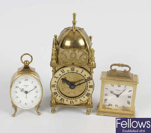 A box containing a mixed selection of assorted clocks and timepieces 