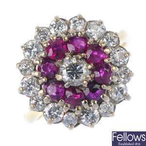 A 1970s 18ct gold ruby and diamond cluster ring.