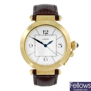 CARTIER - an 18ct yellow gold Pasha wrist watch.