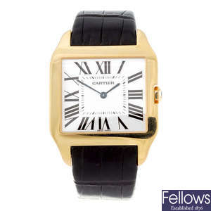 CARTIER - an 18ct rose gold Santos Dumont wrist watch.