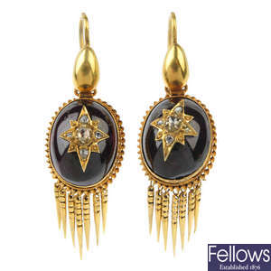 A pair of late 19th century garnet and diamond ear pendants. 