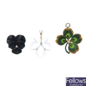 A selection of early 20th century gold floral pendants.