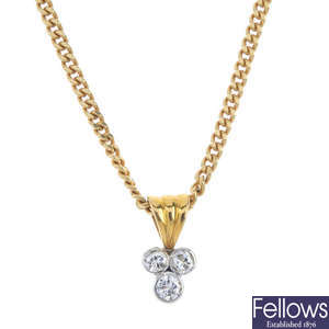 A diamond trefoil pendant, with chain.