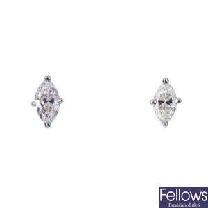 A pair of marquise-shape diamond ear studs.