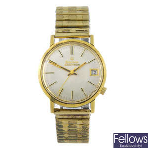 BULOVA - a gentleman's gold plated Accutron bracelet watch with two lady's Omega watches.