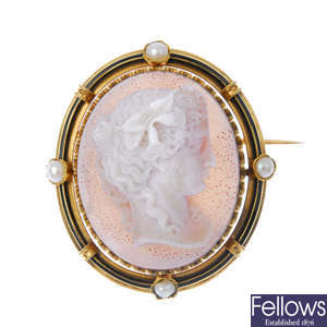 A late 19th century gold hardstone, split pearl and enamel cameo brooch.