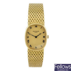 PATEK PHILIPPE - a lady's 18ct yellow gold Golden Ellipse bracelet watch.