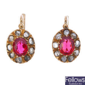 A pair of synthetic ruby and diamond ear pendants.