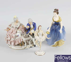 A group of china ballerinas plus a Doulton figure