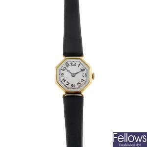 A lady's 18ct yellow gold wrist watch together with a silver watch head.
