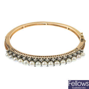A cultured pearl and diamond hinged bangle.