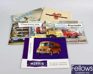  A box containing a selection of vintage motor vehicle showroom brochures and booklets