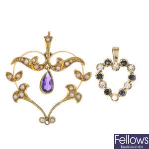 A selection of five gem-set pendants.