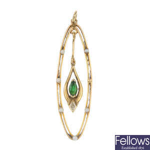 An emerald and seed pearl pendant.